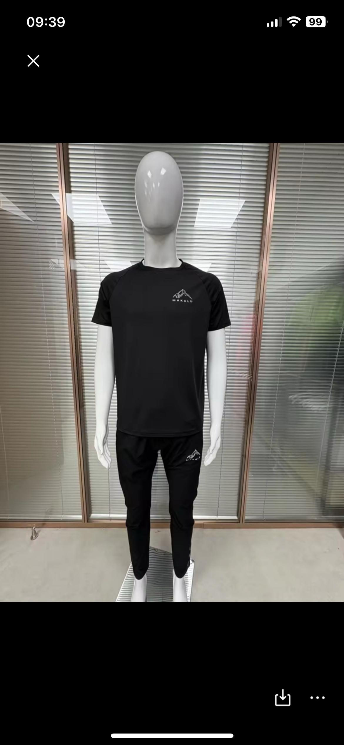 Black Phantom T-Shirt in matte black with reflective logo, athletic fit, and breathable stretch fabric on mannequin