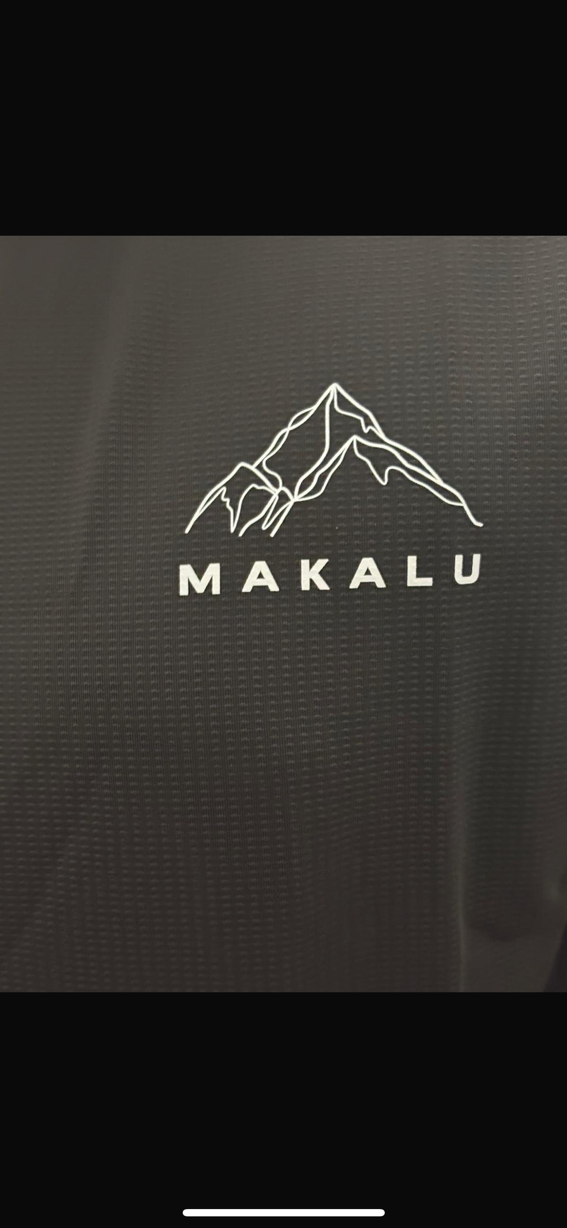 Black and grey men's activewear t-shirt with Makalu mountain logo, moisture-wicking and stretchy fabric blend for comfort and performance